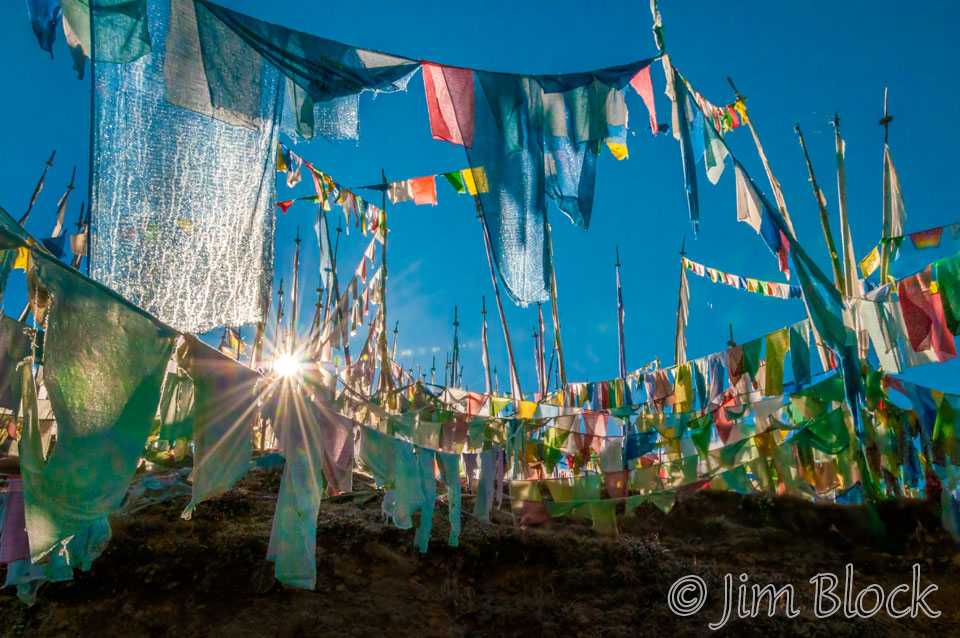 BHU-0988,9-Sun-through-prayer-flags